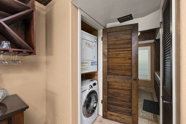 Outdoor poolside seating at Athena Ares Seaside Estate, South Padre Island