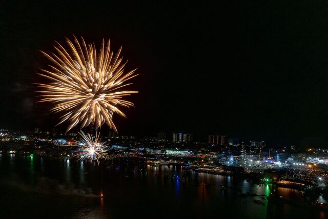 Pool with arches and palms at Athena Ares Seaside Estate, South Padre Island
