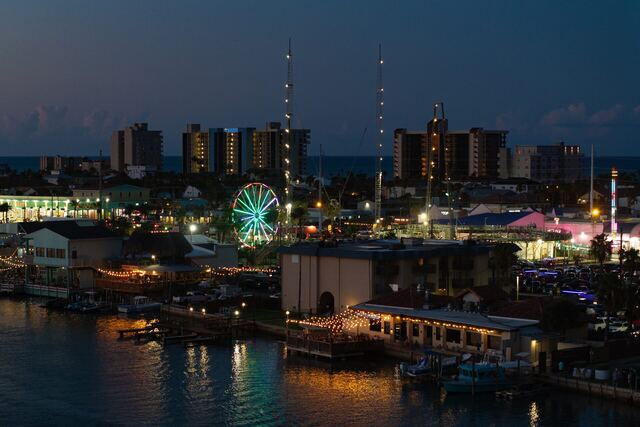 Sun deck with Adirondack chairs at Athena Ares Seaside Estate, South Padre Island